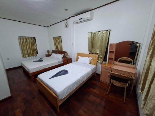 Postel nebo postele na pokoji v ubytování Twin House