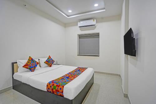 Postel nebo postele na pokoji v ubytování FabHotel Casa