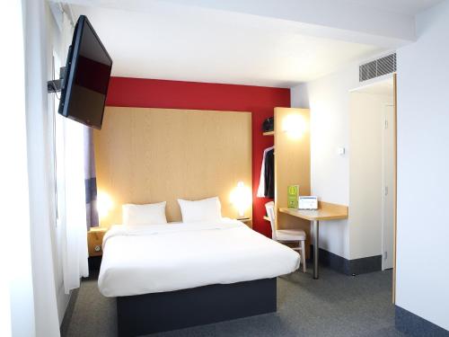 Postel nebo postele na pokoji v ubytování B&B HOTEL Perpignan Sud Marché International