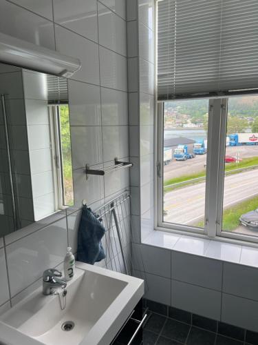 a bathroom with a sink and a window at Apartment in Stryn in Stryn
