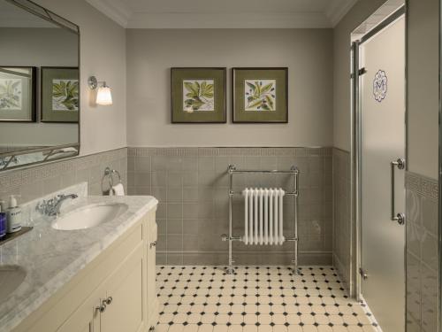 a bathroom with a sink and a shower at Marcliffe in Aberdeen
