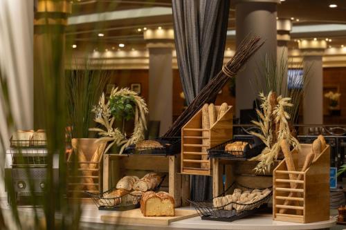 a display of bread and other items in a store window at Hilton Paris Charles De Gaulle Airport in Roissy-en-France