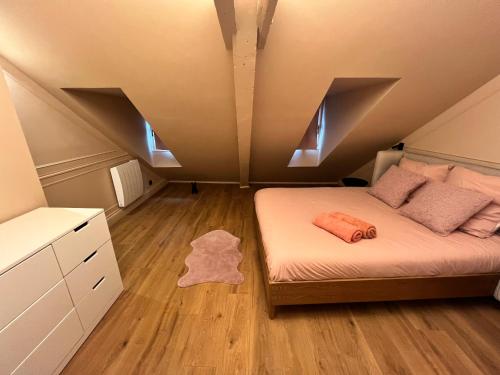 Postel nebo postele na pokoji v ubytování Chez Sandrine, mon appartement élégant + parking