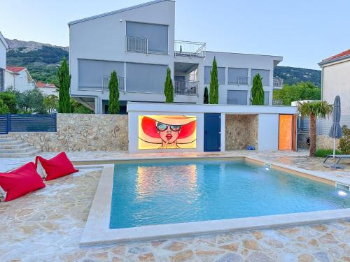 KIANA - Apartment Baska mit Dachterrasse, Meerblick sowie große Poolarea