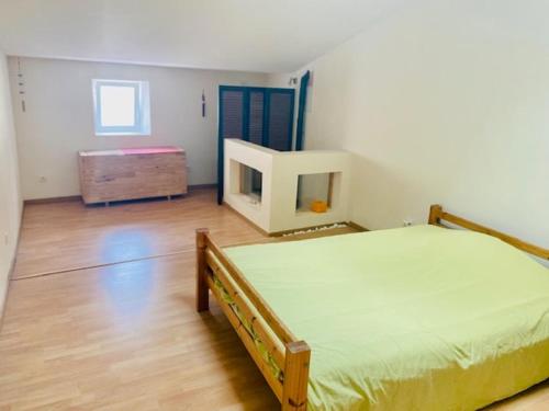 Postel nebo postele na pokoji v ubytování Village house