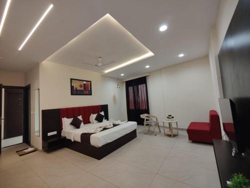 Ένα ή περισσότερα κρεβάτια σε δωμάτιο στο D Horizon Hotel & Restaurant
