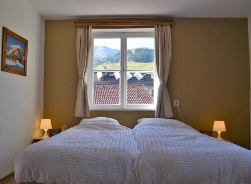 Ένα ή περισσότερα κρεβάτια σε δωμάτιο στο Kraxner Haus