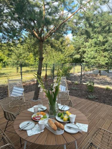 Photo de la galerie de l'établissement Domki nad jeziorami Niedźwiady, à Ślesin