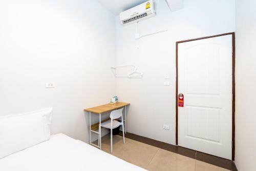 Giường trong phòng chung tại เดอะ ฮิดเด้น ตรอกข้าวสาร The Hidden Khaosan