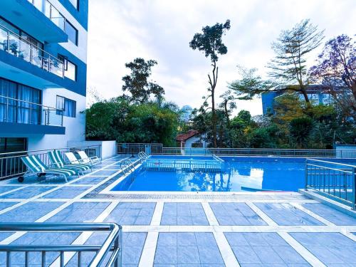 Πισίνα στο ή κοντά στο 17th The Maze Suites - Pool, Gym, Play