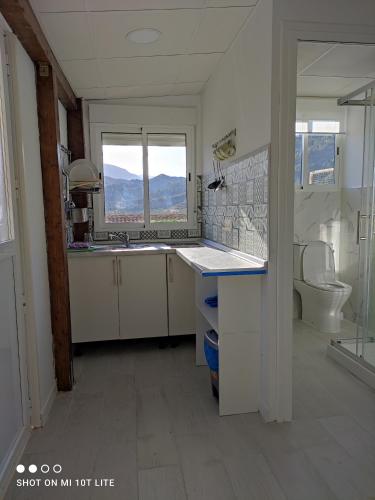 Ένα μπάνιο στο apartamento genil