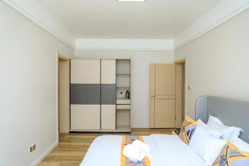 Postel nebo postele na pokoji v ubytování Park View Luxury Apartments