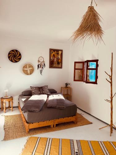 a bedroom with a bed in a room at Sun & Sea Lodge Ocean roof in Essaouira