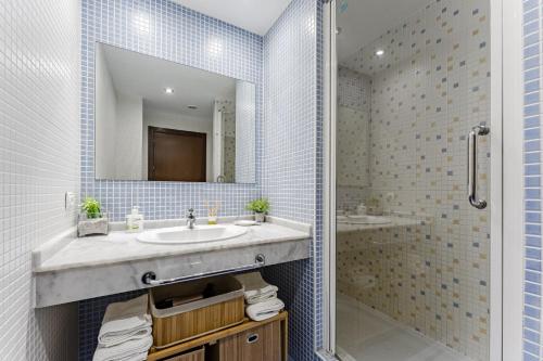 Ένα μπάνιο στο PALM-MAR Paradise with pools and AC