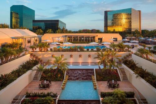 an aerial view of a resort with a swimming pool at The Westin South Coast Plaza, Costa Mesa in Costa Mesa