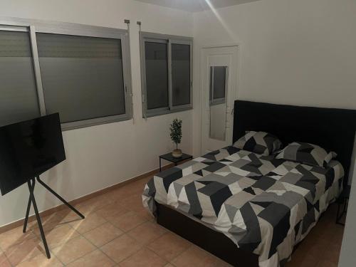 Ένα ή περισσότερα κρεβάτια σε δωμάτιο στο Superbe Loft 100m2 proche du centre de Toulouse