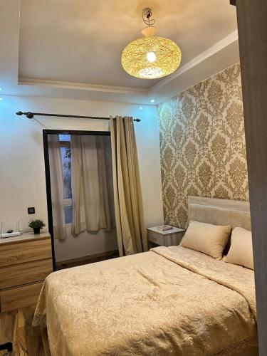 Postel nebo postele na pokoji v ubytování Cozy apartment