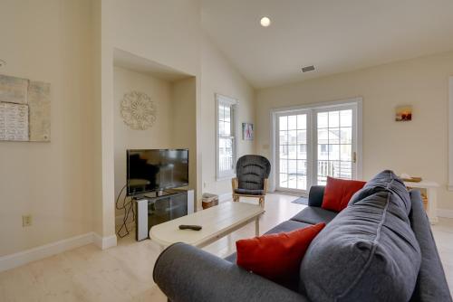 a living room with a couch and a tv at Ocean City Family Getaway about Qtr-Mi to Beach! in Ocean City