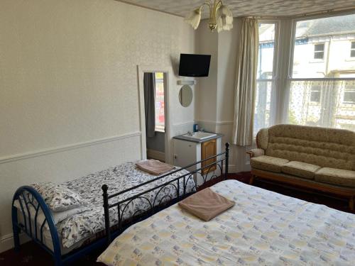 Postel nebo postele na pokoji v ubytování Coastal Place