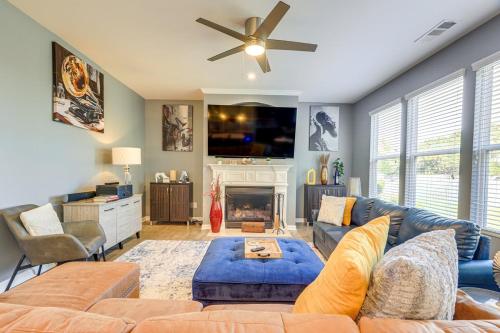 a living room with a couch and a fireplace at Airport Home in Union City