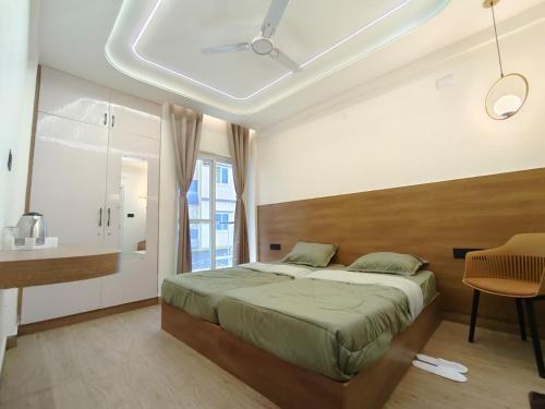 Ένα ή περισσότερα κρεβάτια σε δωμάτιο στο infinity inn