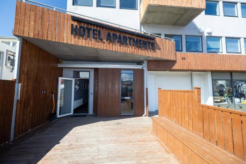 a building with a sign that reads rodeo applications at LL Properties - TB24 The Boutique Flat in Akureyri