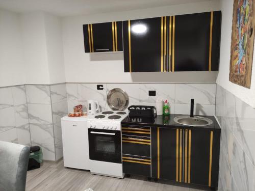 Η κουζίνα ή μικρή κουζίνα στο Apartment City Hall