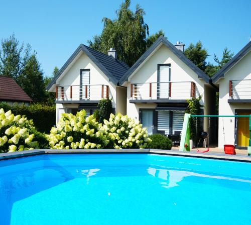 Niebiańskie Zacisze-Domki z Sauną i Basenem