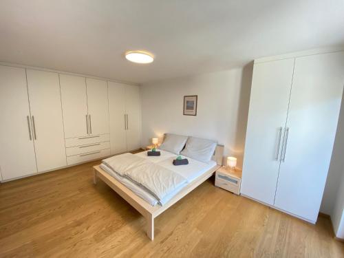 Postel nebo postele na pokoji v ubytování Ruhiges City Apartment mit Balkon - Wohlfühlen in Graz
