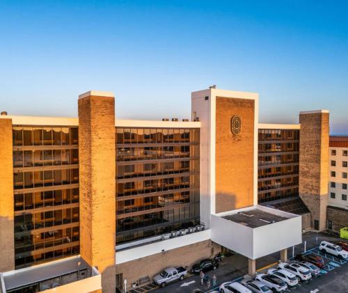 an aerial view of a building with a parking lot at Barclay Towers by CoolVacay in Virginia Beach