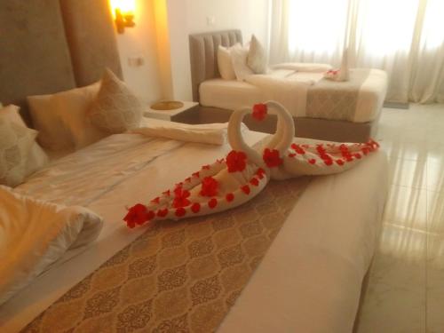 Postel nebo postele na pokoji v ubytování Piyum Villa Kosgoda