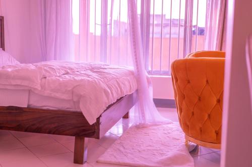 Una cama o camas en una habitación de Northern Skyz Villas