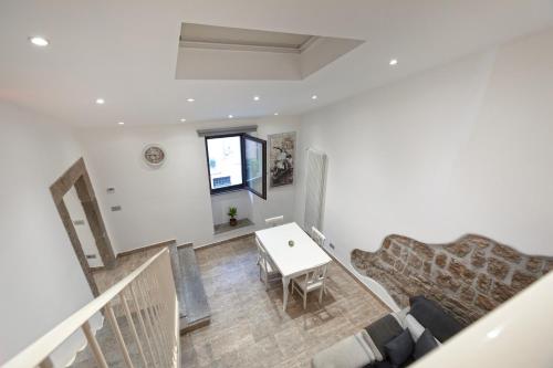 a living room with a couch and a table at Residenza San Marco in Viterbo