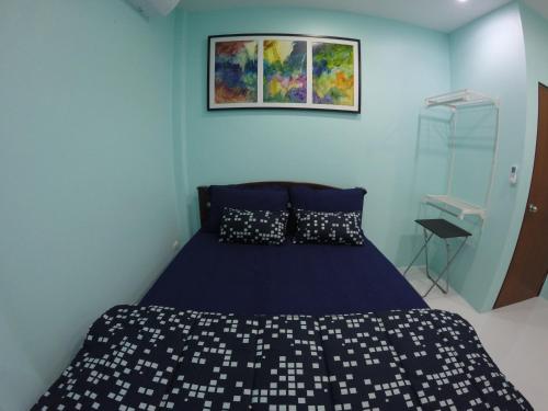 Ένα ή περισσότερα κρεβάτια σε δωμάτιο στο Best Rent a Room