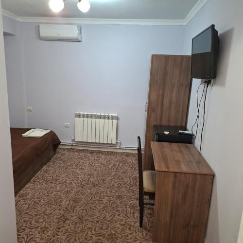 TV i/ili multimedijalni sistem u objektu Hotel Internagional