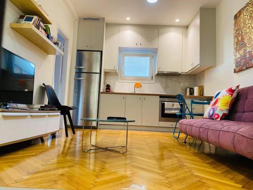 In the heart of Athens overlooking Kalligas Square!