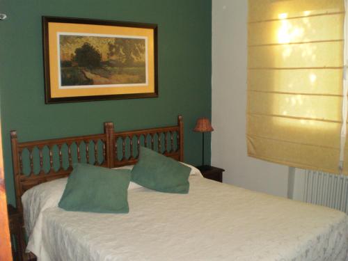 Ένα ή περισσότερα κρεβάτια σε δωμάτιο στο Villa Karina