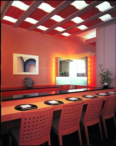 a dining room with a table and chairs at GRAND NIKKO AWAJI in Awaji