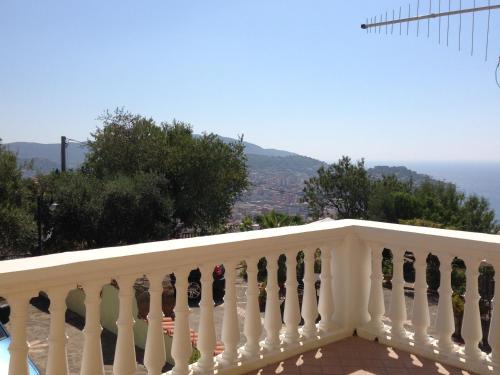 a white balcony with a view of the ocean at Villa Malandrino Guest House in Agropoli