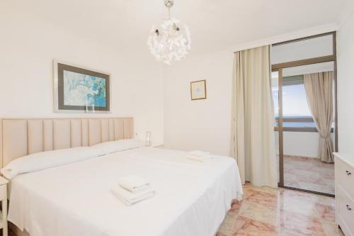 Beachfront apartment with panoramic sea views, private parking, swimming pools and mini golf