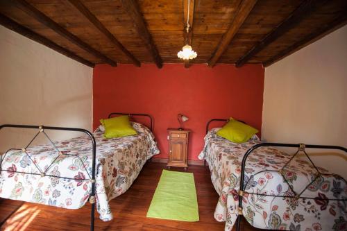 Giường trong phòng chung tại Casa Vidal