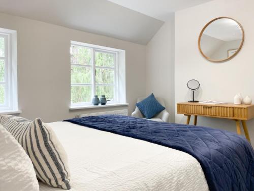 Voodi või voodid majutusasutuse 2 Woodbine Cottage toas