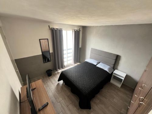 Ένα ή περισσότερα κρεβάτια σε δωμάτιο στο Casa Luna CUATLANCINGO VW VAL QUIRICO