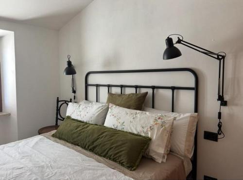 Postel nebo postele na pokoji v ubytování La casa di Rina