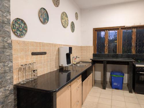 Кухня или мини-кухня в Villa Candolim
