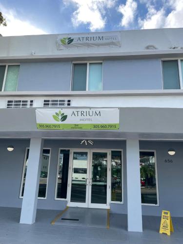 a building with a sign on the front of it at Atrium Hotel, Trademark Collection by Wyndham in Miami