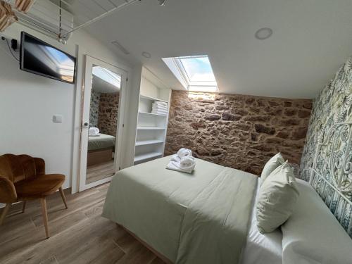 Postel nebo postele na pokoji v ubytování Casa estilo rural en Beluso,Boiro BY CRISTIANYTAMARA