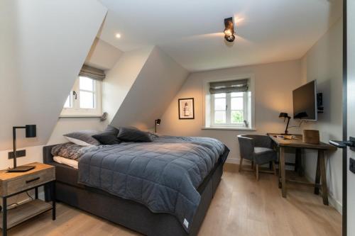 Postel nebo postele na pokoji v ubytování Hausteil Tichelee-Hus, Tinnum, Sylt