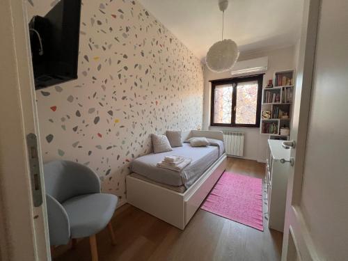 Giường trong phòng chung tại dormiacasamia