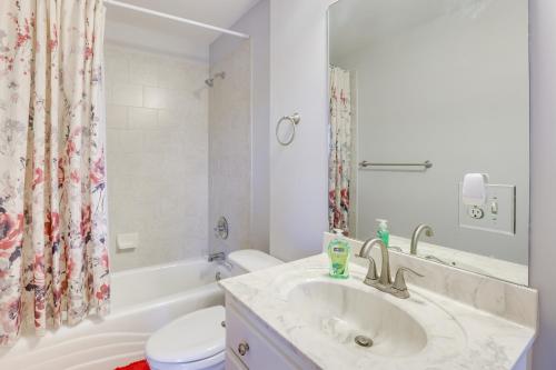 a bathroom with a sink and a toilet and a tub at 8 Mi to University of Alabama Family Home with Yard in Englewood